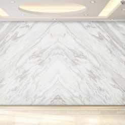 Tranh đá đối xứng marble volakas trắng vân mây EM 12 tạo điểm nhấn cho phòng khách